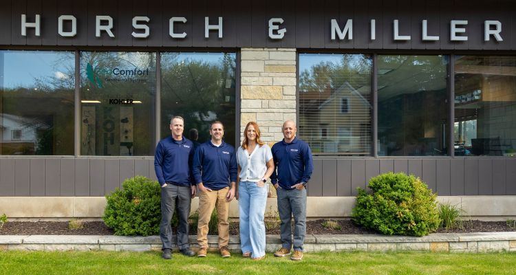 Horsch & Miller team standing in front of the Slinger WI office building